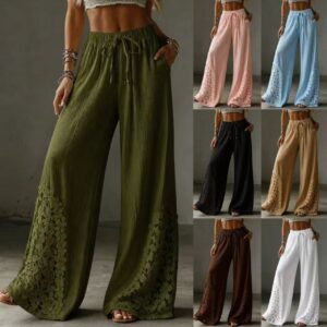 Pantalon ample en dentelle à jambes larges, avec poches plaquées et cordon de serrage à la taille