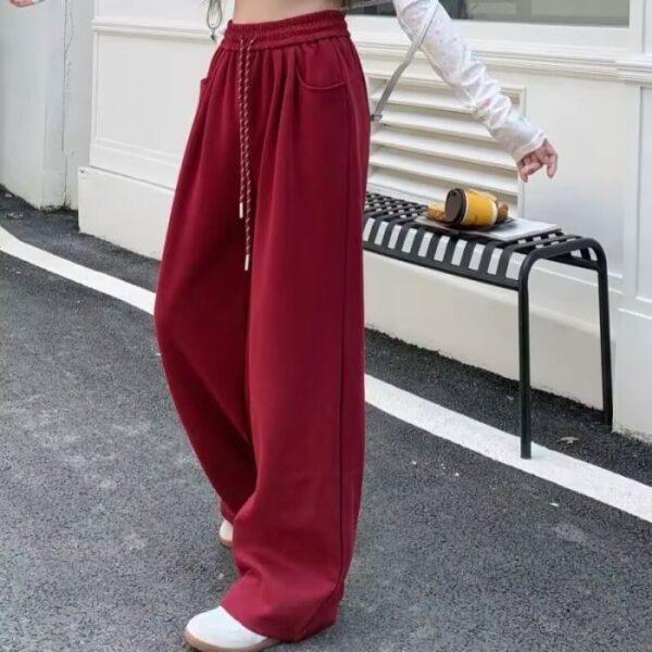 Pantalon de sport ample à taille haute, coupe droite et tombante, style « mop »