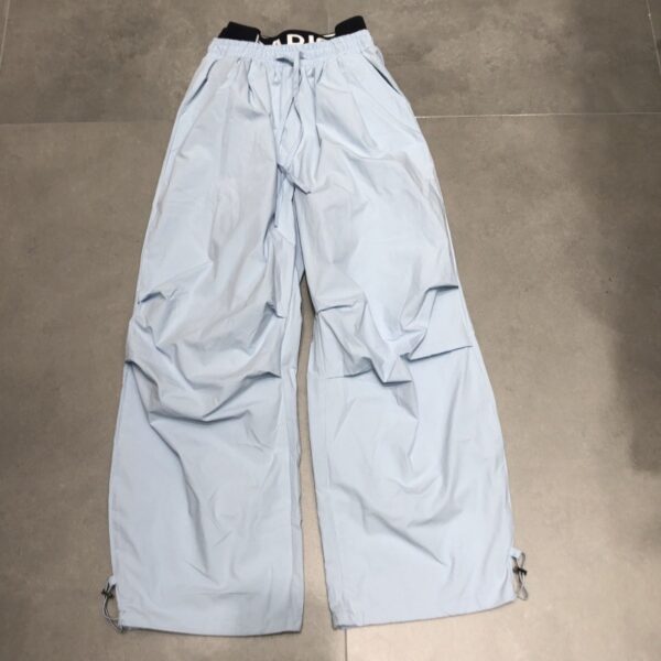 Pantalon de sport ample à jambes droites pour femme, style « faux deux-pièces », avec empiècements à la taille double