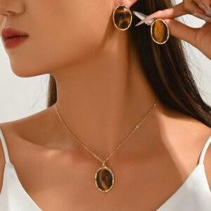 Collier vintage transfrontalier européen et américain pour femme, design original avec boucles d'oreilles en imitation œil-de-tigre, ensemble de bijoux polyvalent avec chaîne au niveau de la clavicule